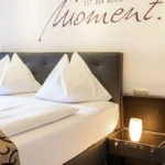 familienzimmer bockhartsee bett detail hergerichtet bad gastein